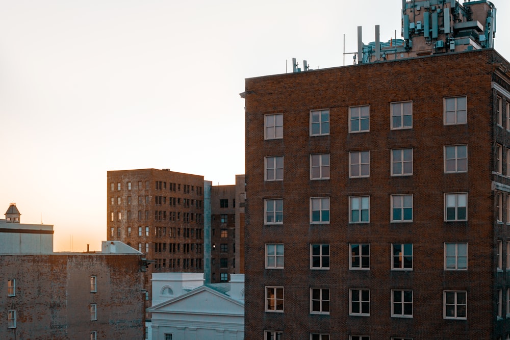 brown concrete building under white sky during daytime