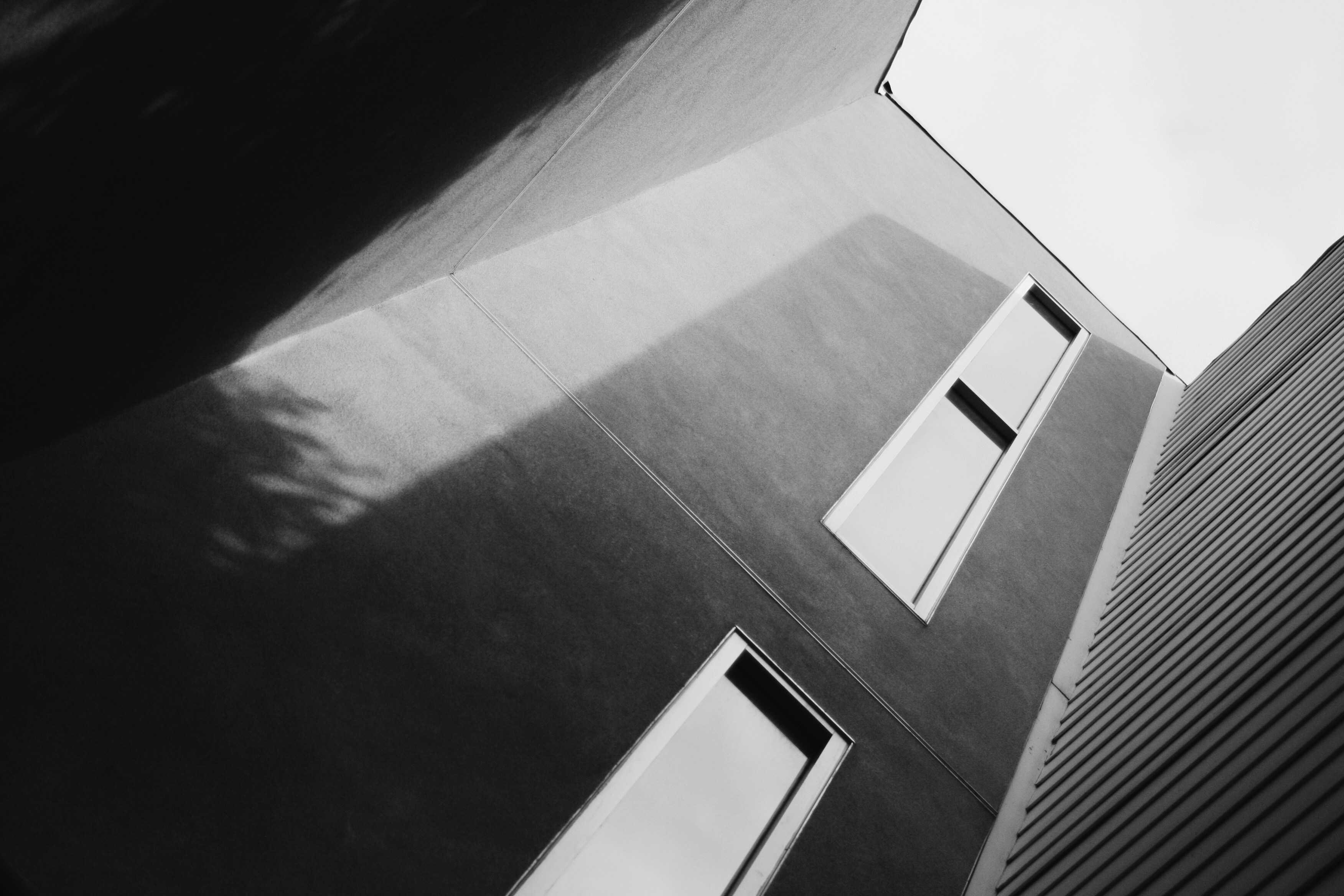 grayscale photo of concrete building