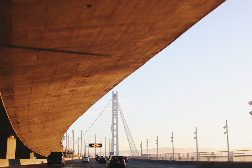 people walking on bridge during daytime