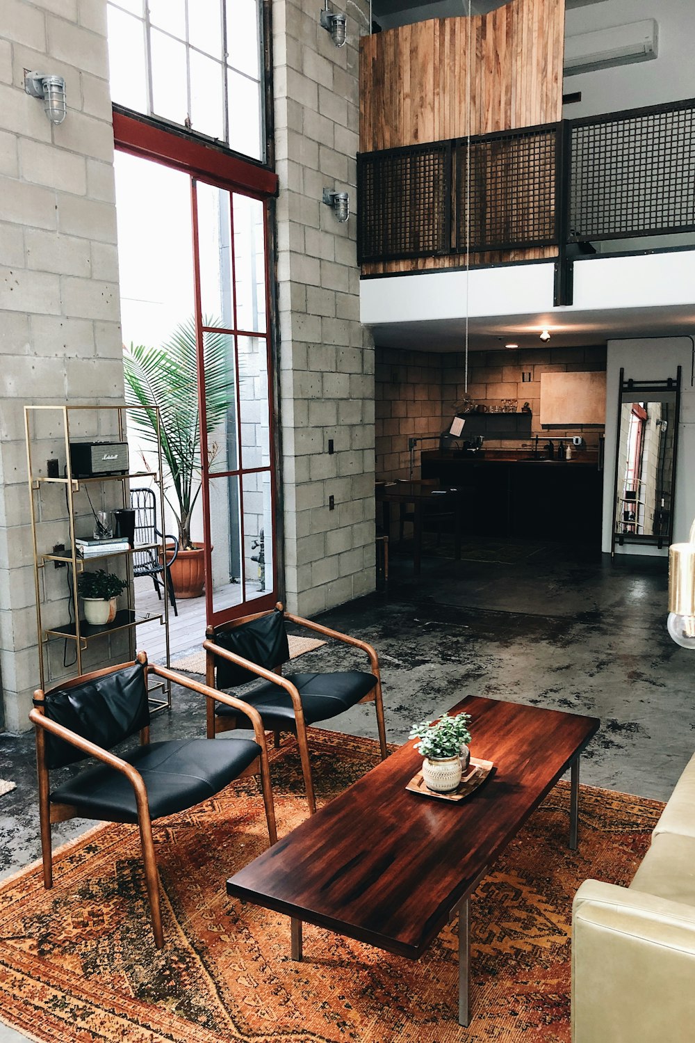 brown wooden table near green potted plant