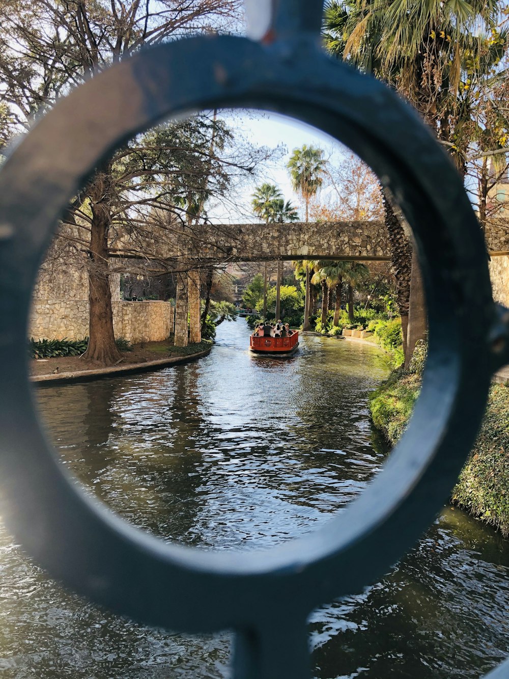 red boat on river during daytime