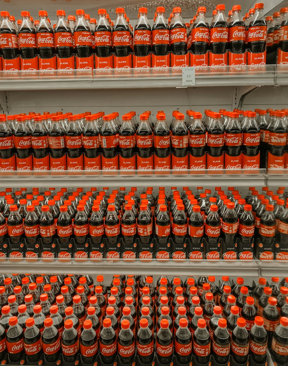 coca cola bottle on shelf