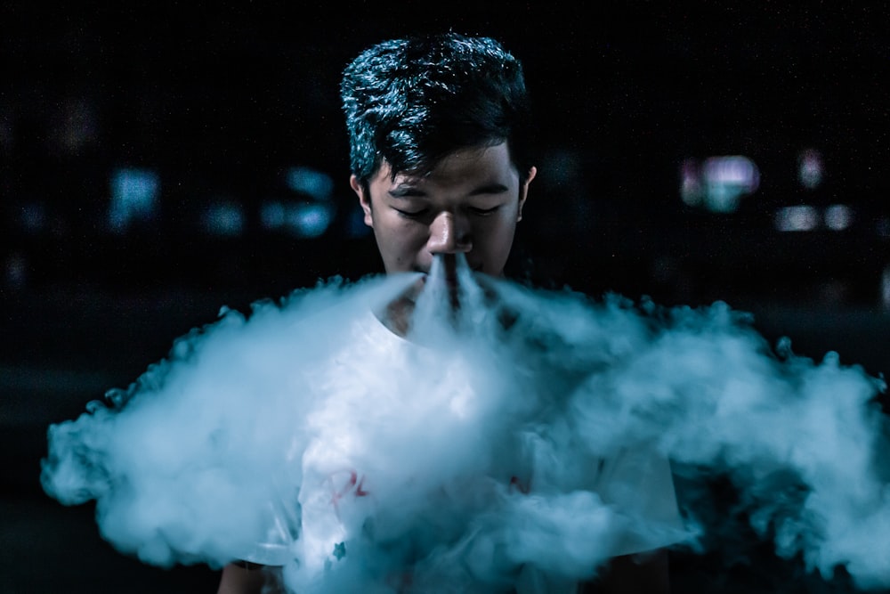 man smoking wearing black shirt