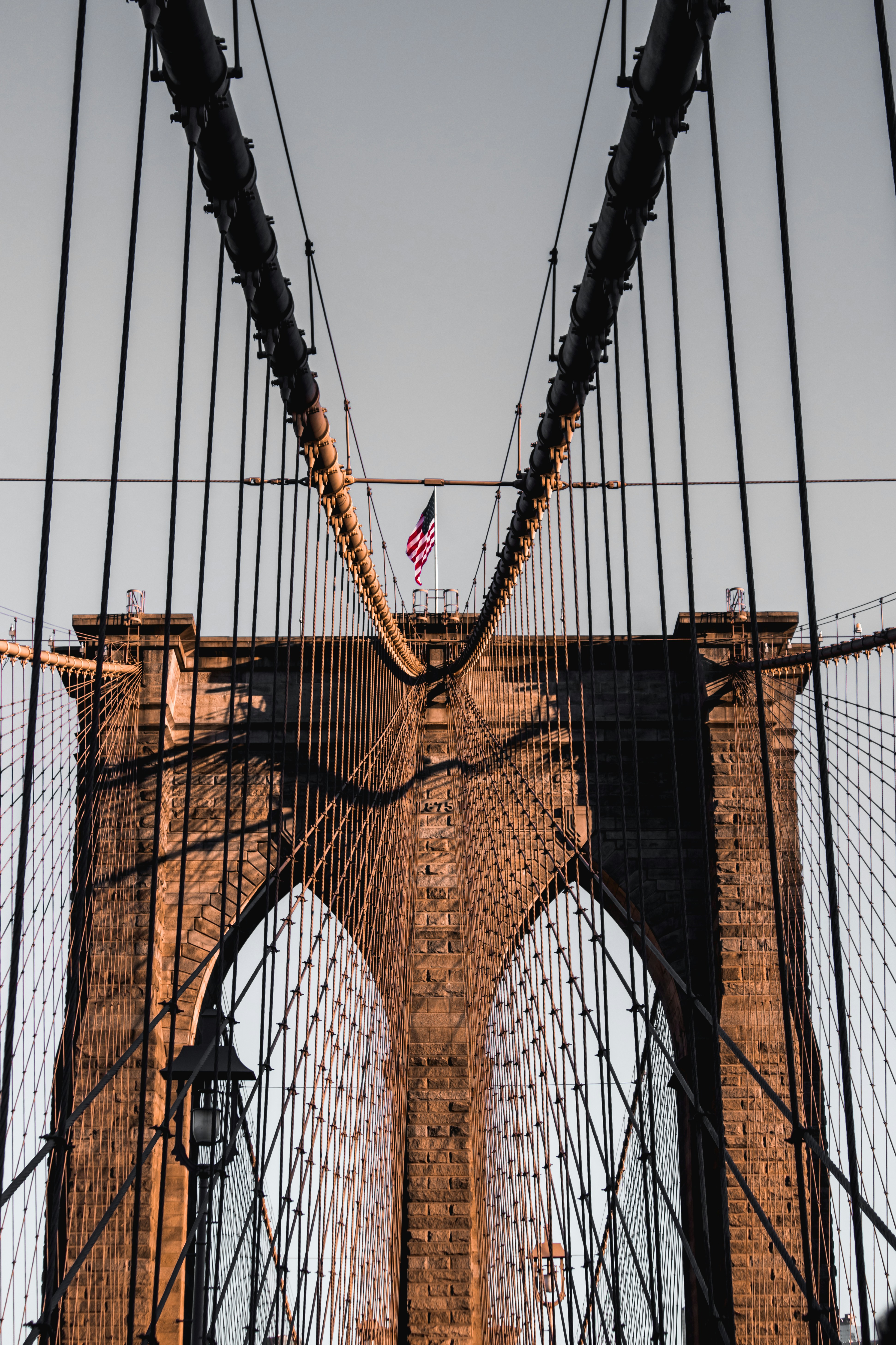 brown bridge under blue sky during daytime