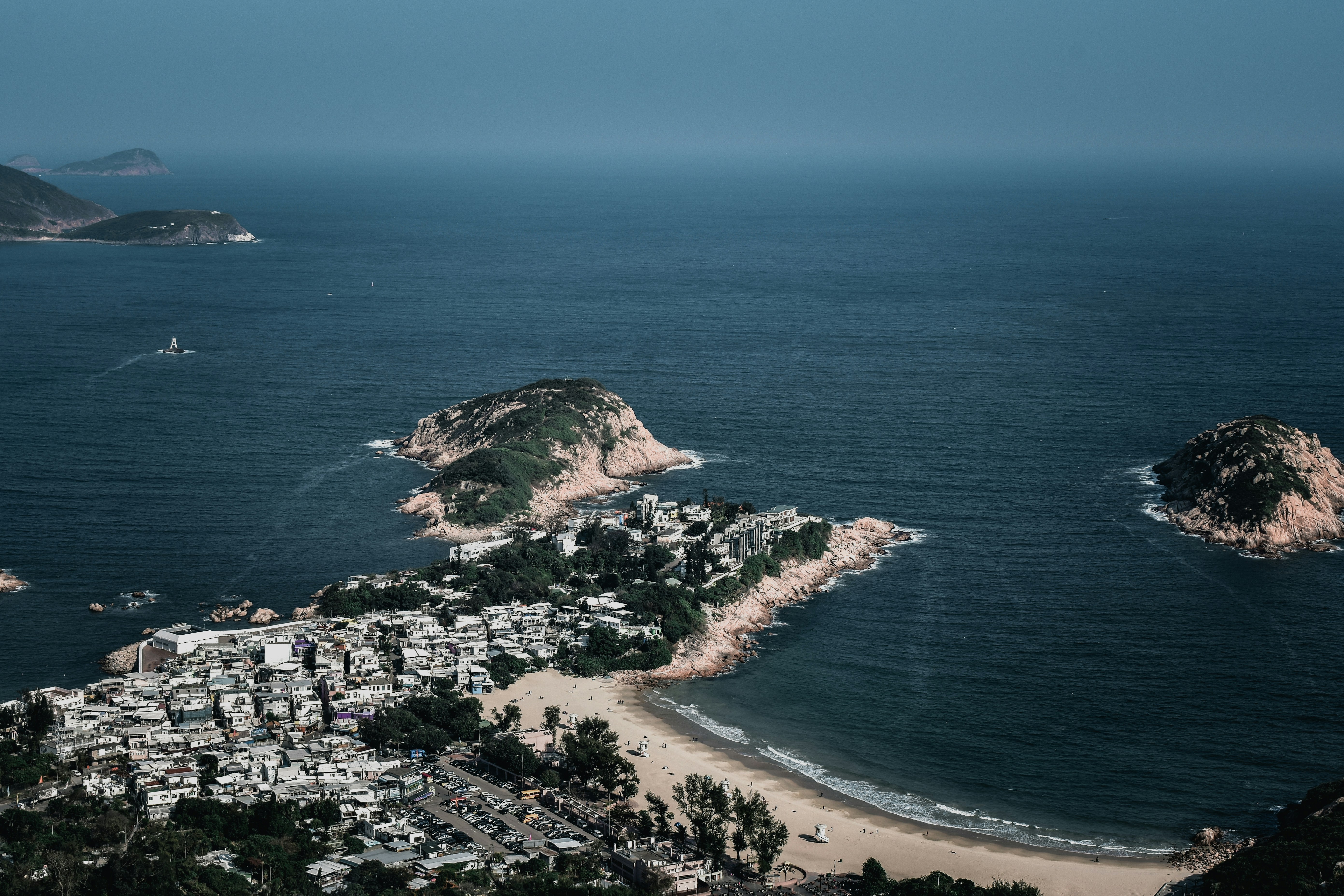 aerial view of green and brown island during daytime