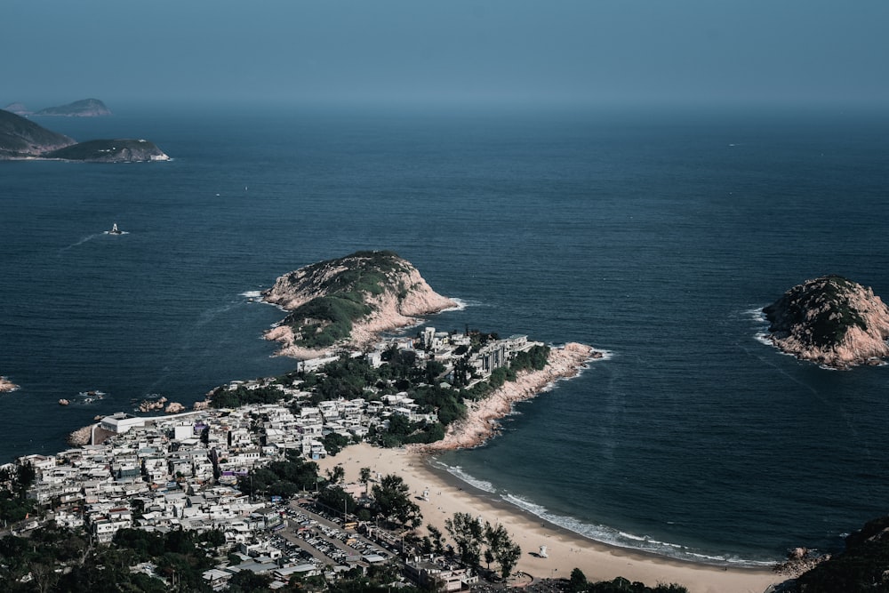 aerial view of green and brown island during daytime