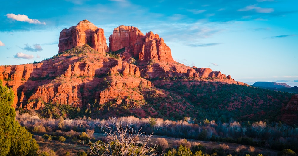 brown rocky mountain under blue sky during daytime