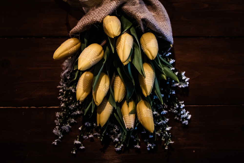 yellow corn on brown wooden table