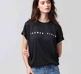 woman in black crew neck t-shirt and blue denim jeans