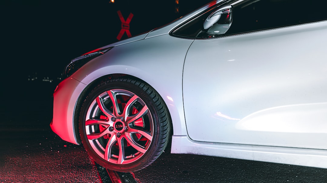 white car with red wheel