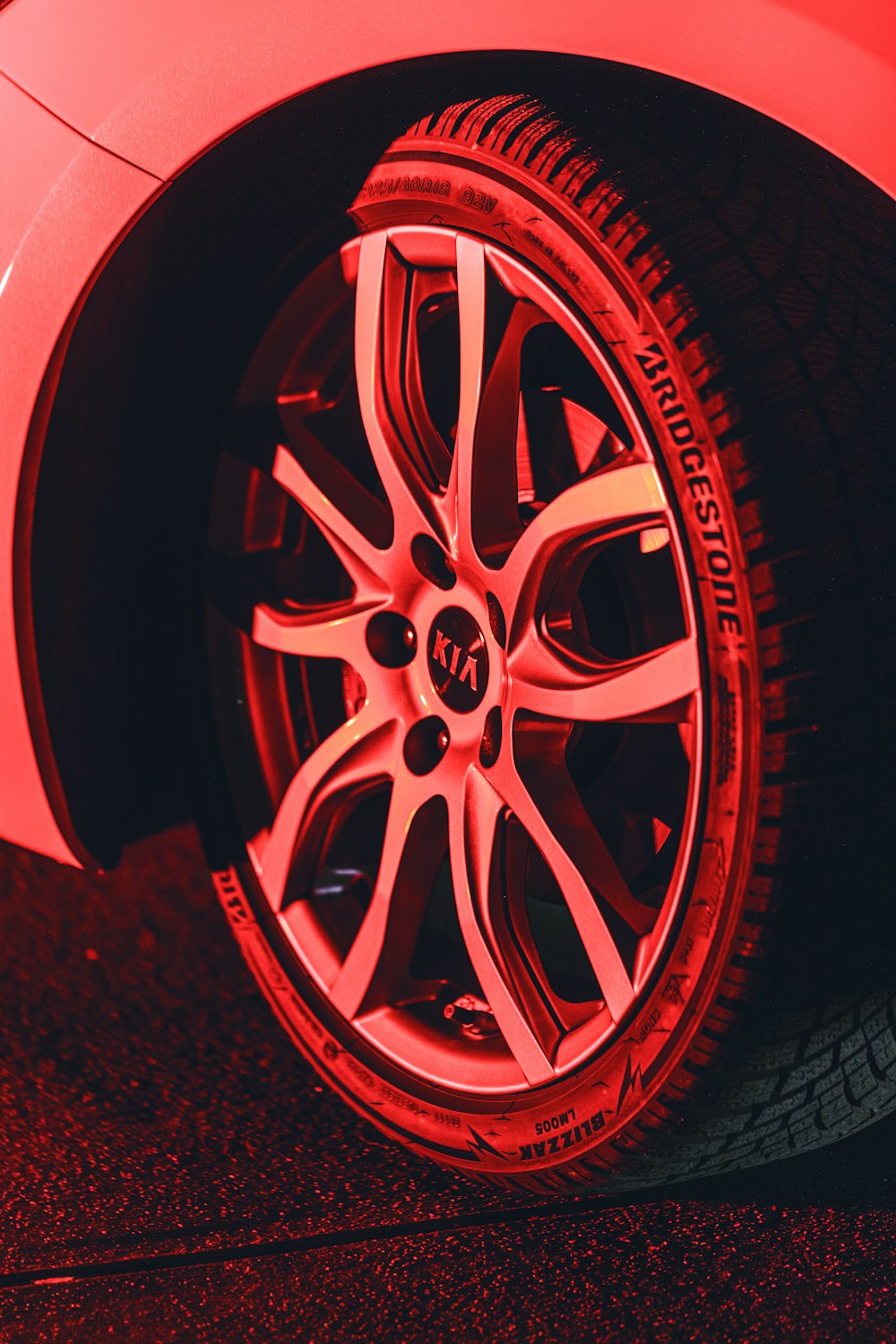 red and silver car wheel