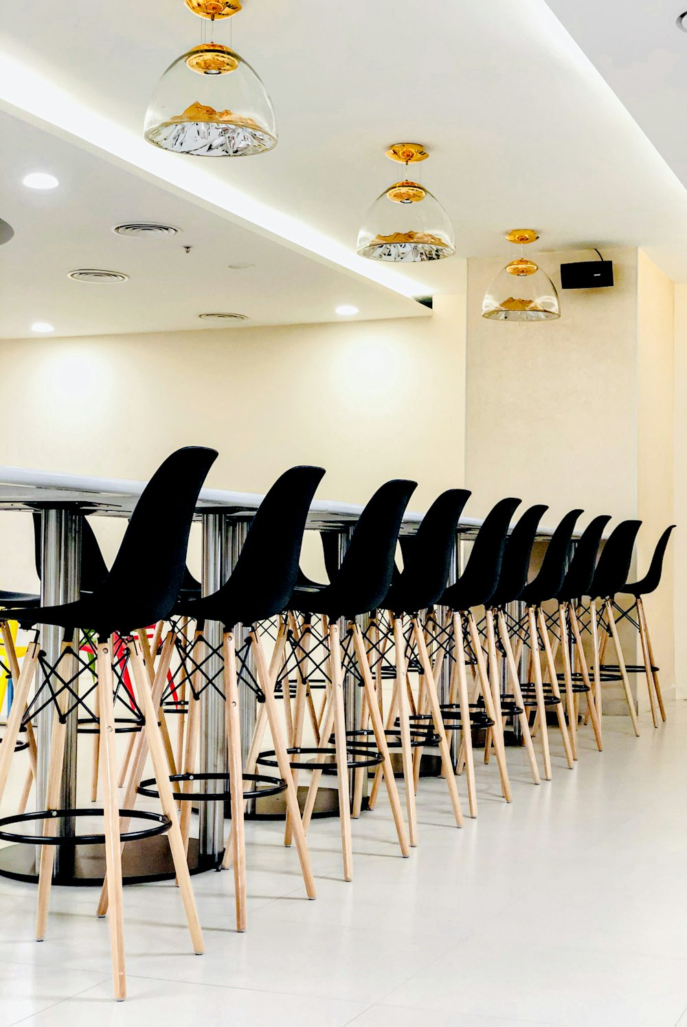 white metal folding chairs inside room