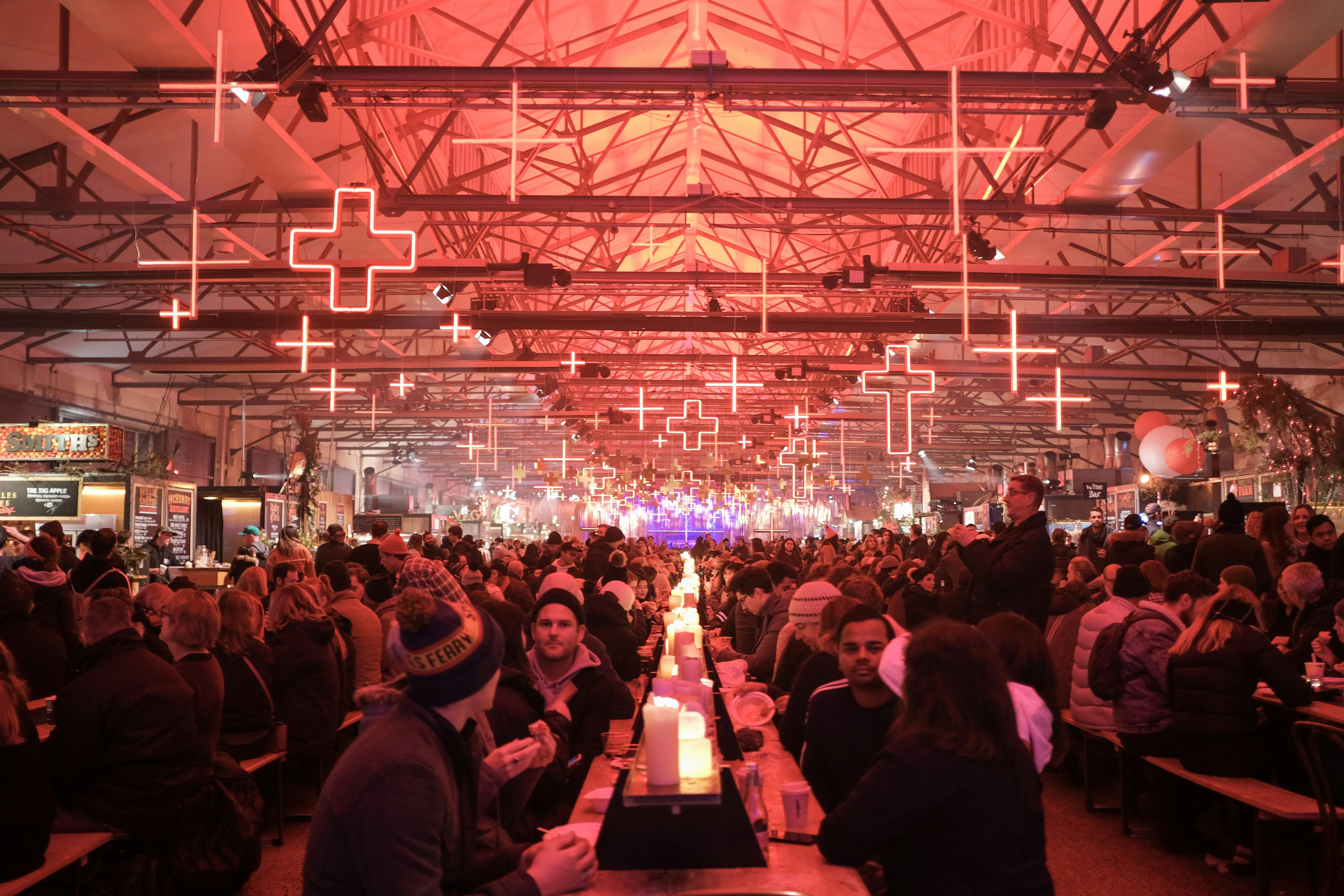 people sitting on chair in front of stage