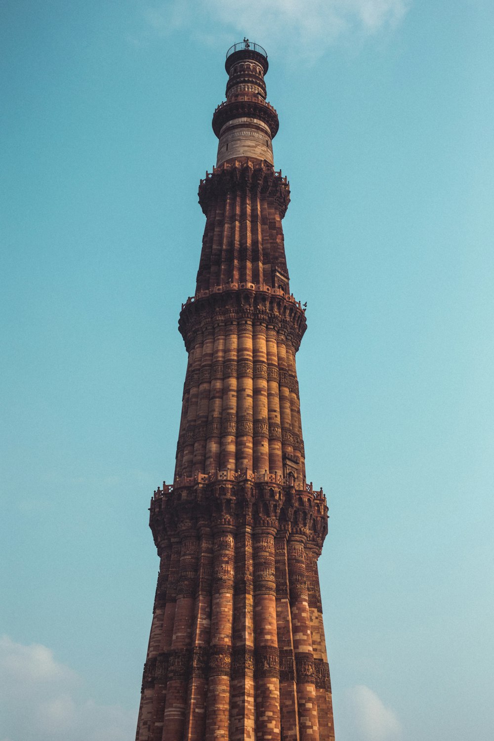 brown concrete tower under blue sky during daytime