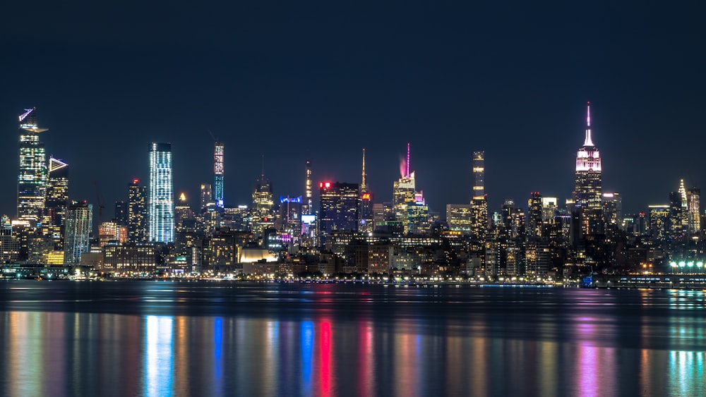 city skyline during night time