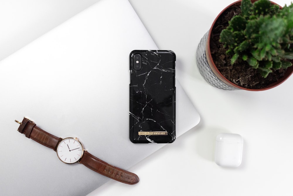 space gray iphone 6 on white table