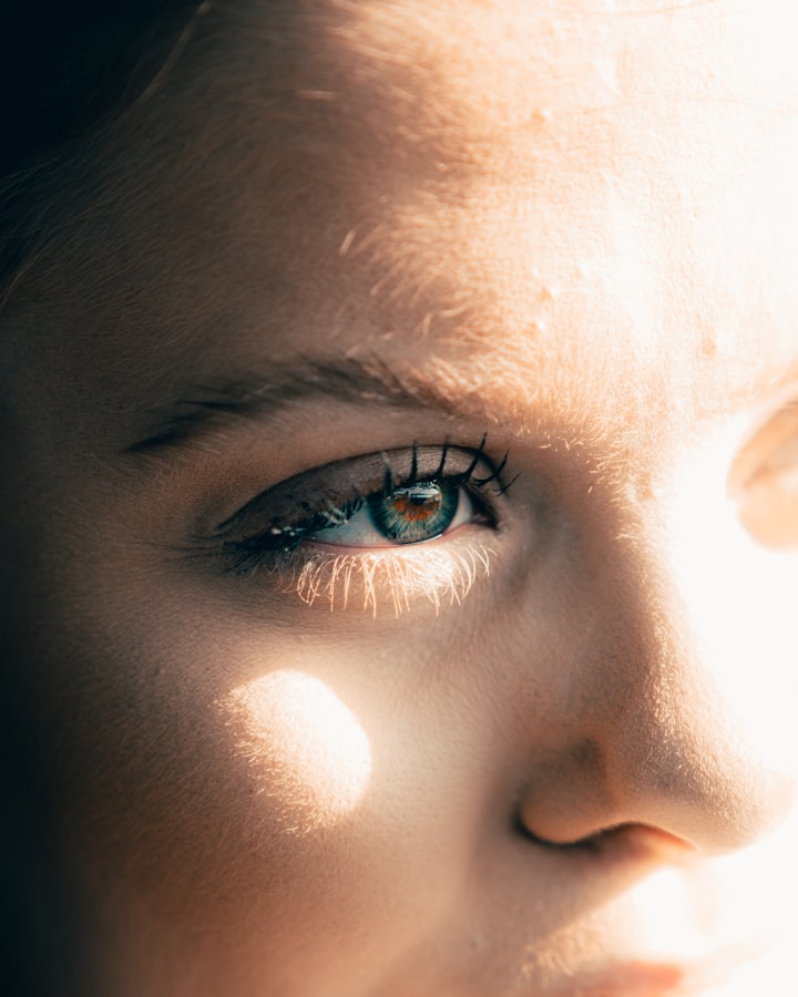 Close-up photograph of a person's eye, directly literalising the eye lens of flash design №011