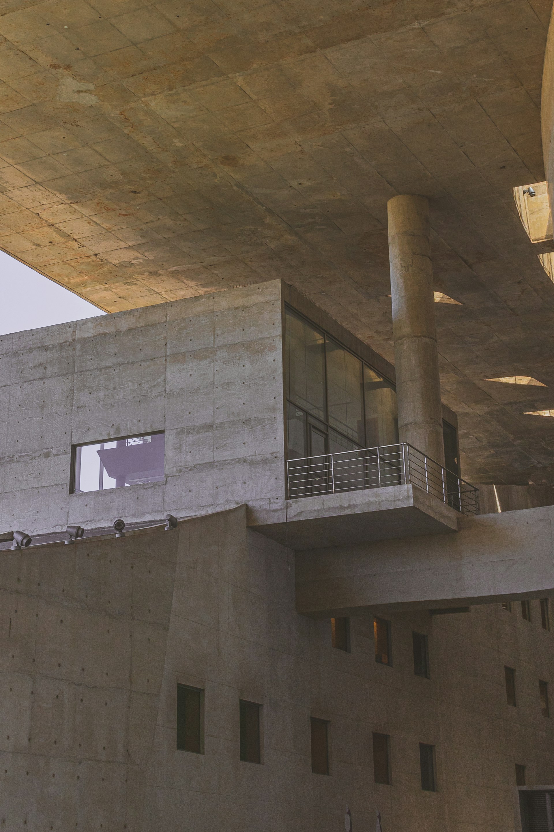 woman wearing yellow long-sleeved dress under white clouds and blue sky during daytime