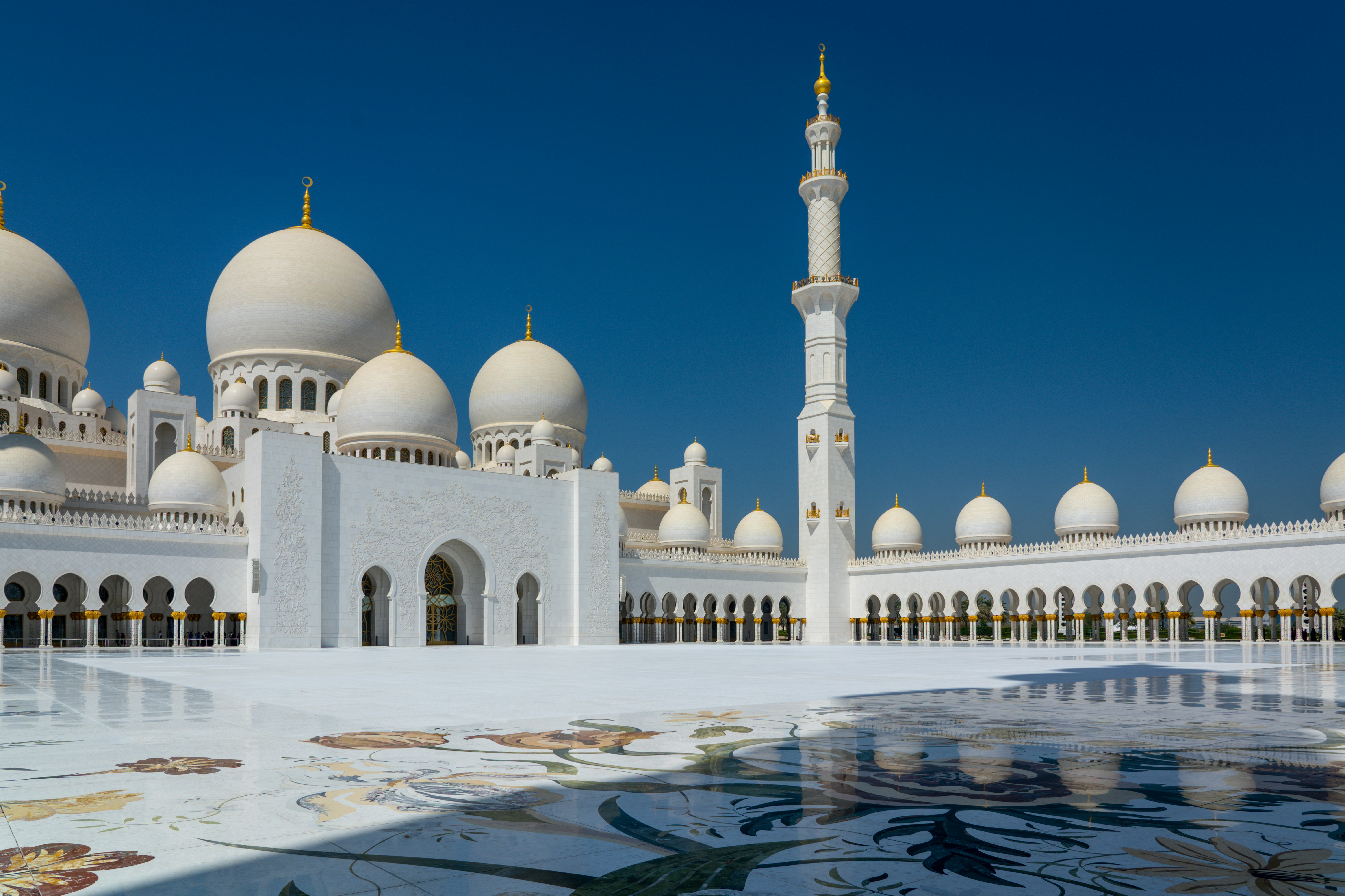 white and brown dome building under blue sky during daytime, The Sheikh Zayed Mosque, Abu Dhabi, United Arab Emirates.  Such an amazing religious site.  The 3rd largest mosque in the world, allowing up to 41,000 people to pray.