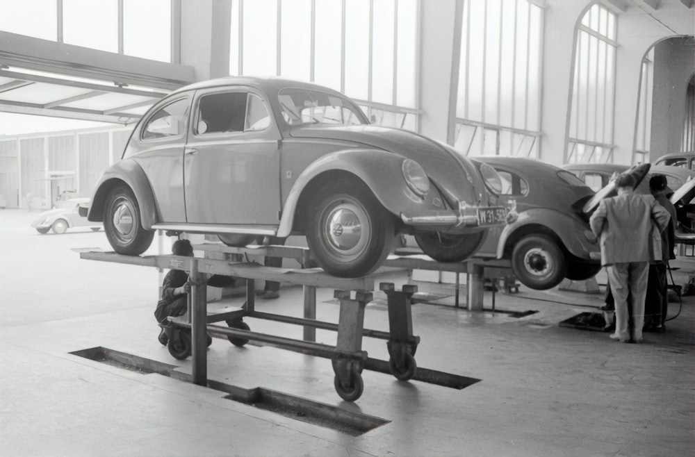 grayscale photo of vintage car