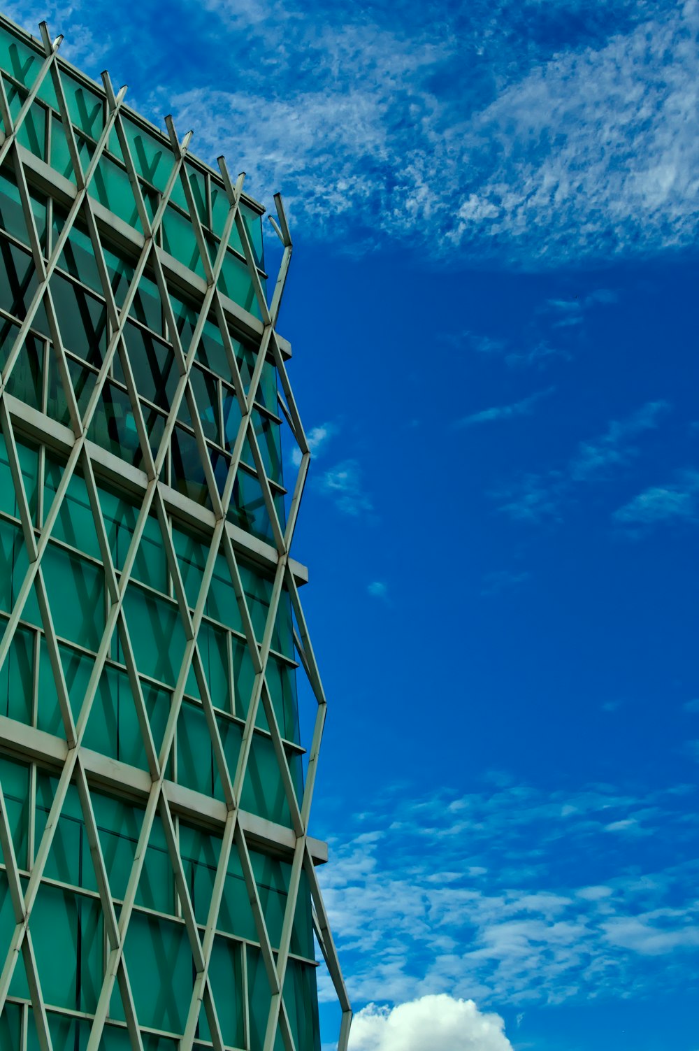 white and blue concrete building under blue sky during daytime