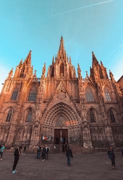 brown concrete building under blue sky during daytime