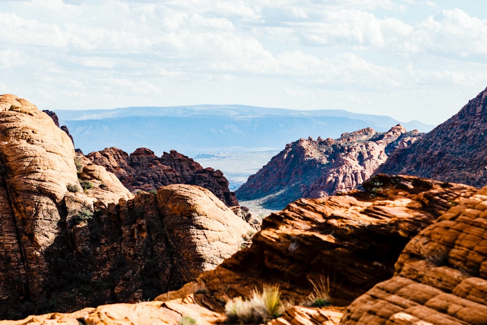 brown rocky mountain under blue sky during daytime