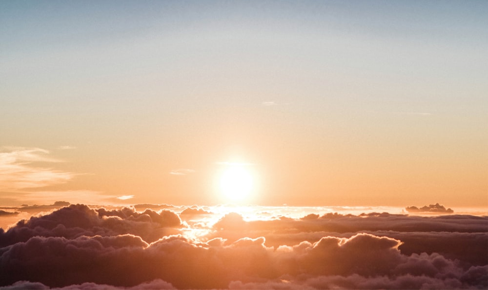 clouds and sun during sunset