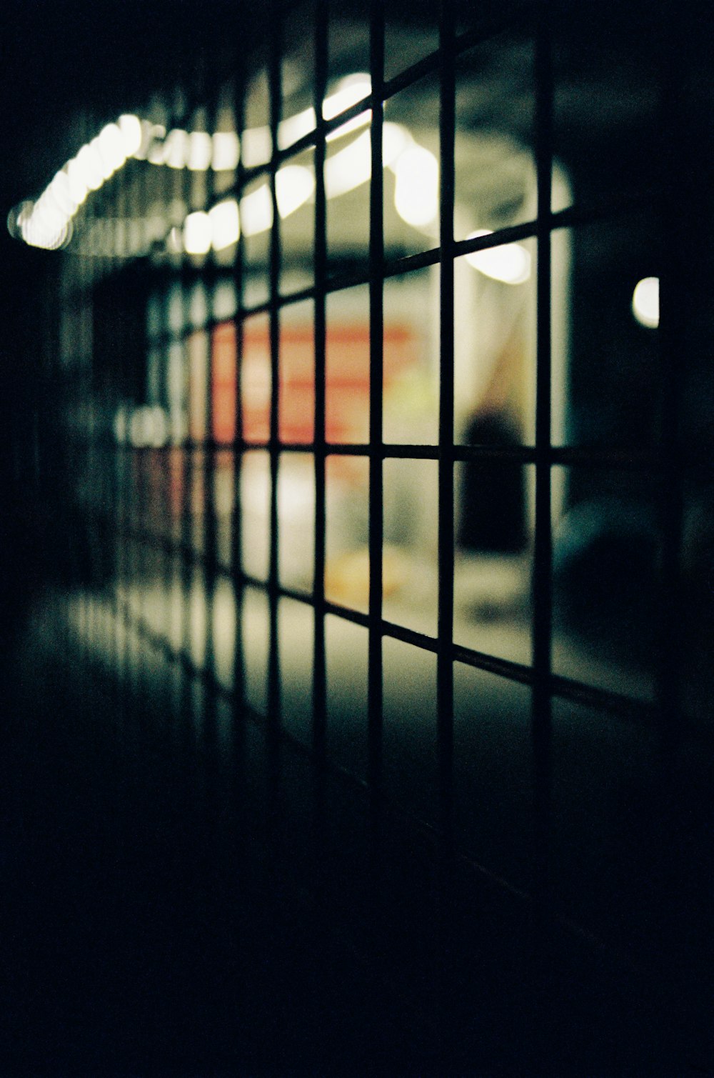 black metal fence during daytime