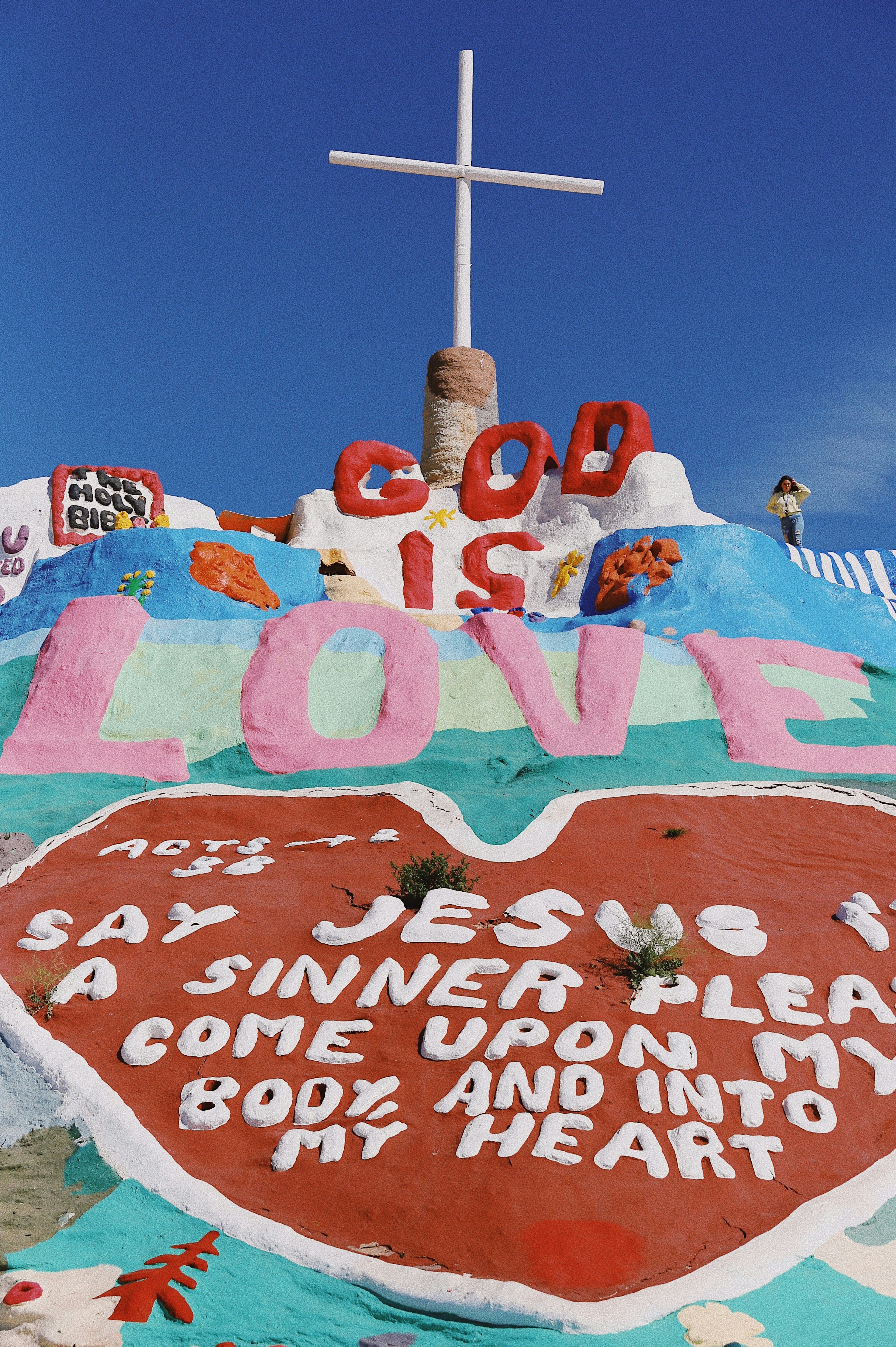red and white hello kitty print textile