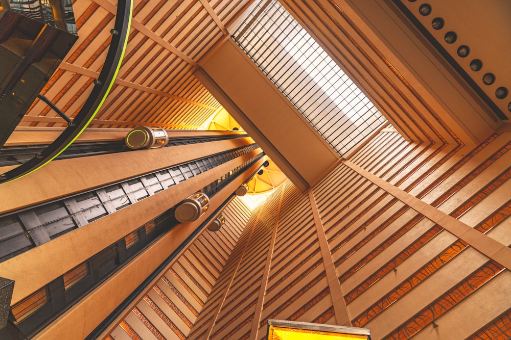 brown wooden ceiling with green and yellow light