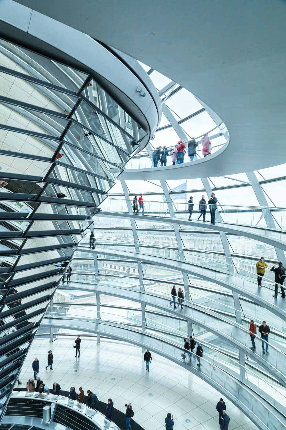 a group of people standing inside of a building