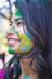 woman with blue and green face paint