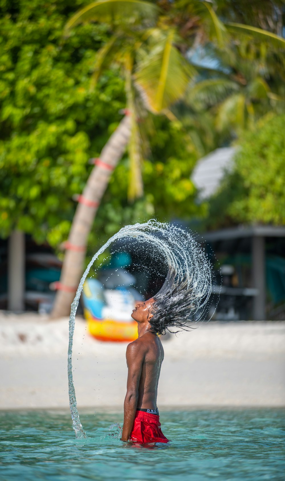 person holding water fountain during daytime