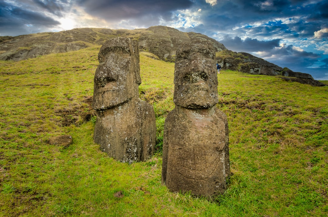 brown stone formation on green grass field during daytime, Moais<p></figure>Rano Raraku - Rapa Nui - CHILE
