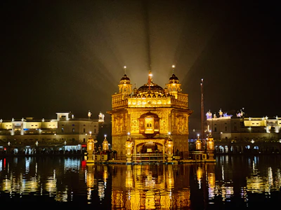 Golden temple architecture glowing warmly at sunset, reflecting the rich cultural heritage taught at Sri Thepa School.