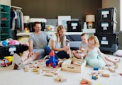 A happy family enjoying time together with various Parcelove products in a bright, inviting room.