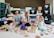A cheerful family enjoying quality time while playing with colorful children's toys.