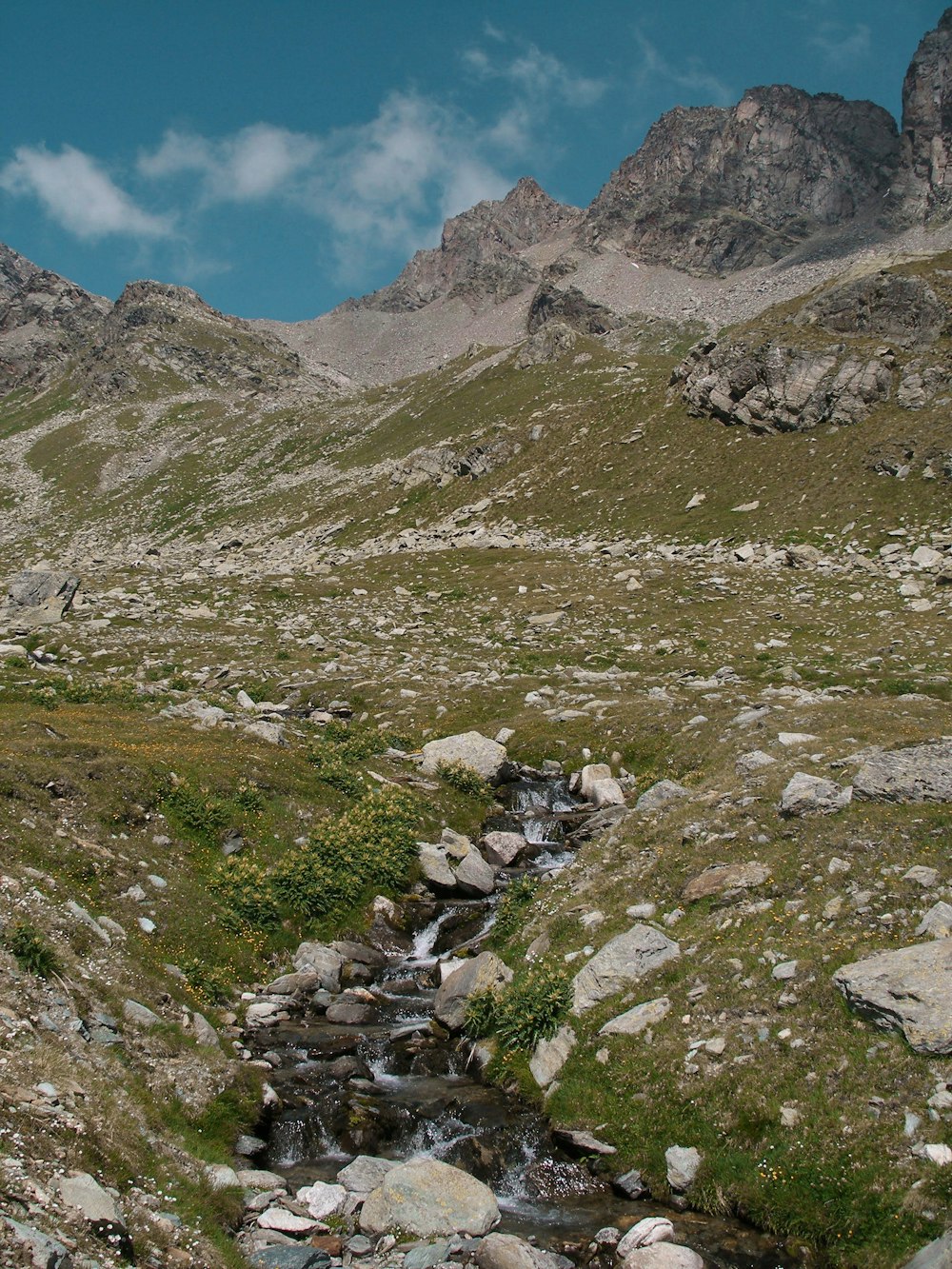 green and brown mountains under blue sky during daytime