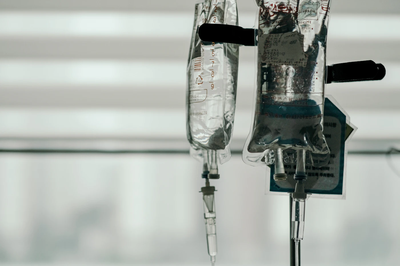 Electric blue IV fluid bag ready for a mobile visit