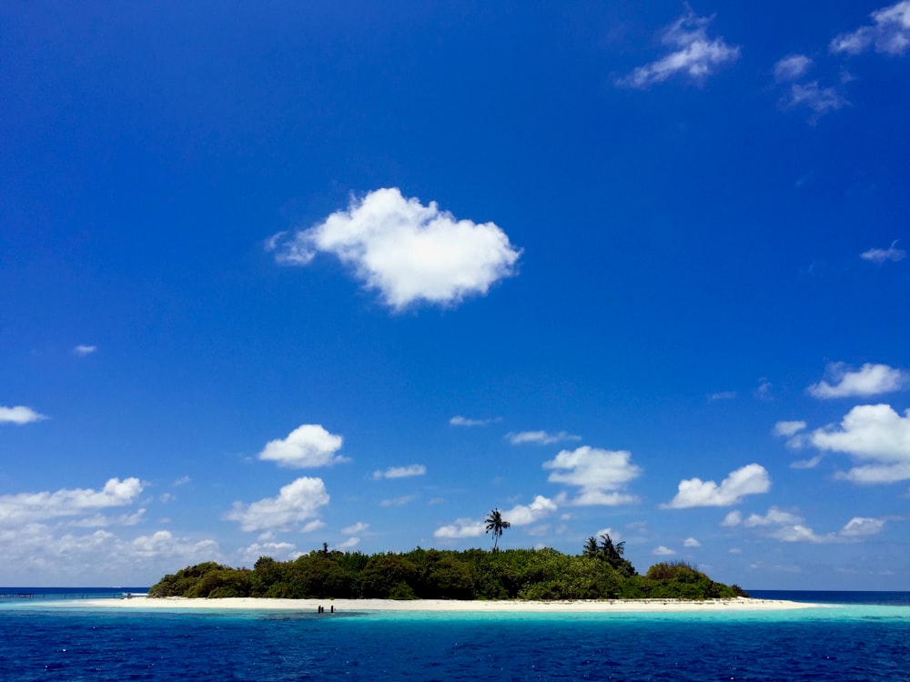 blue sky and white clouds over sea