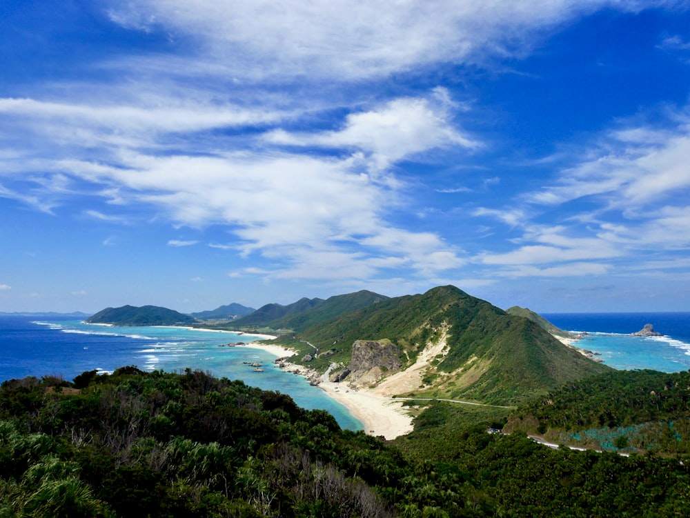 green mountains under blue sky during daytime