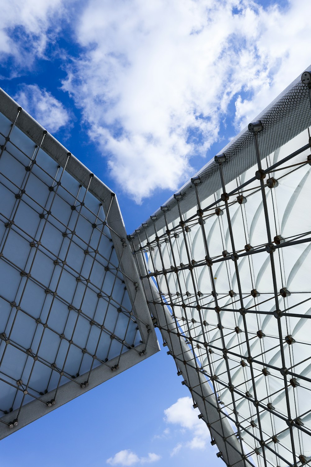 white and black metal frame under blue sky during daytime