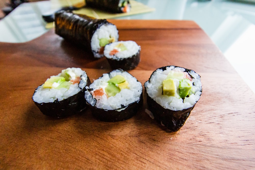 sushi on black ceramic plate