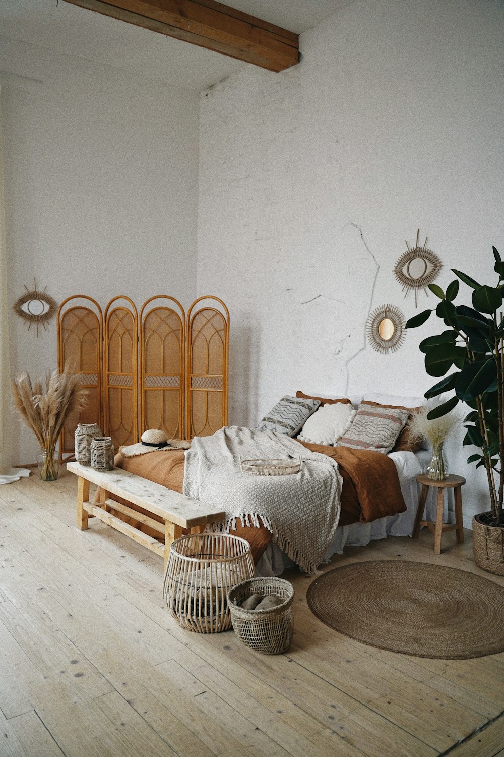 brown wooden door near brown woven armchair