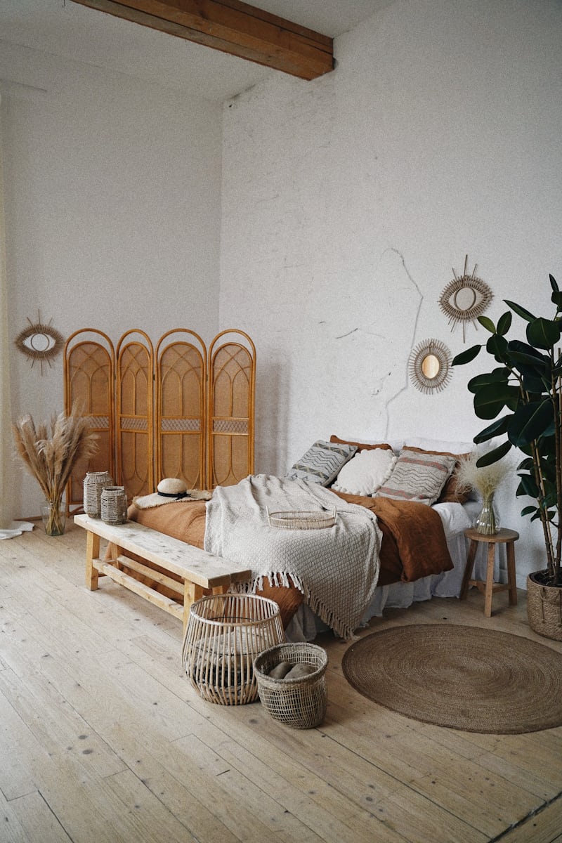 Aesthetic boho bedroom with layered cushion and throwovers