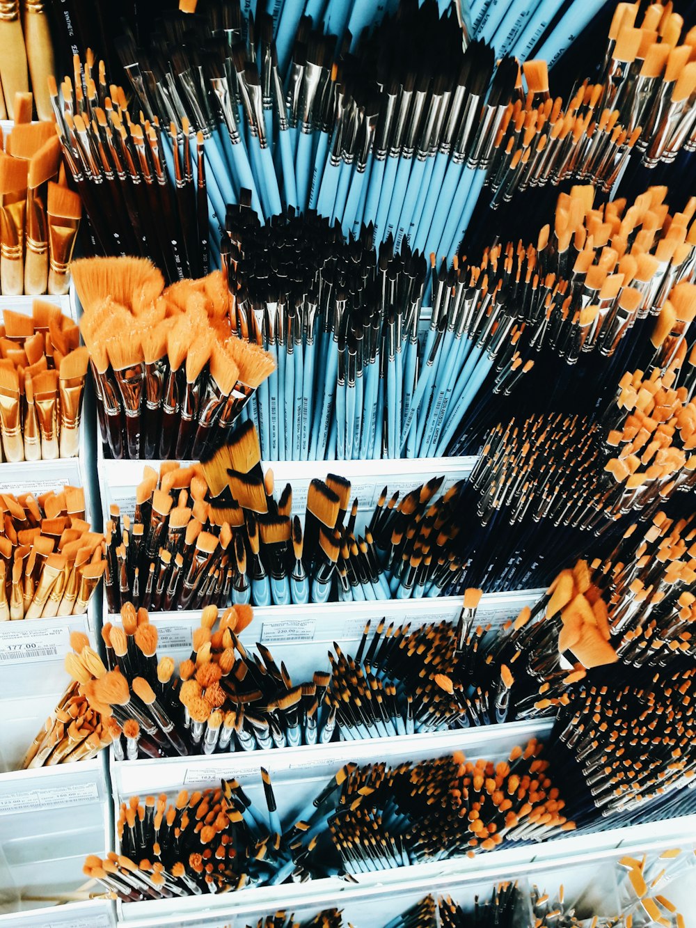 black and white brush on white wooden shelf