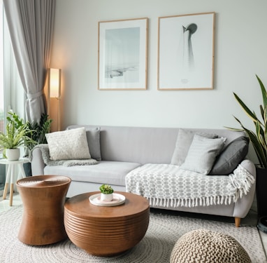 a living room filled with furniture and a large window