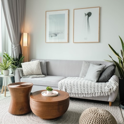 a living room filled with furniture and a large window