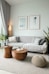 a living room filled with furniture and a large window